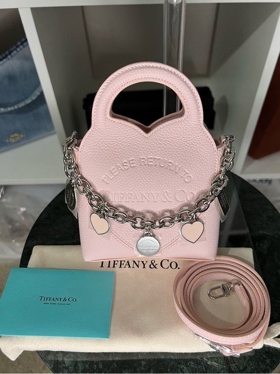 Tiffany & Co. Handbags - Tiffany & Co. Light Pink Mini Tote with Heart Charm Chain